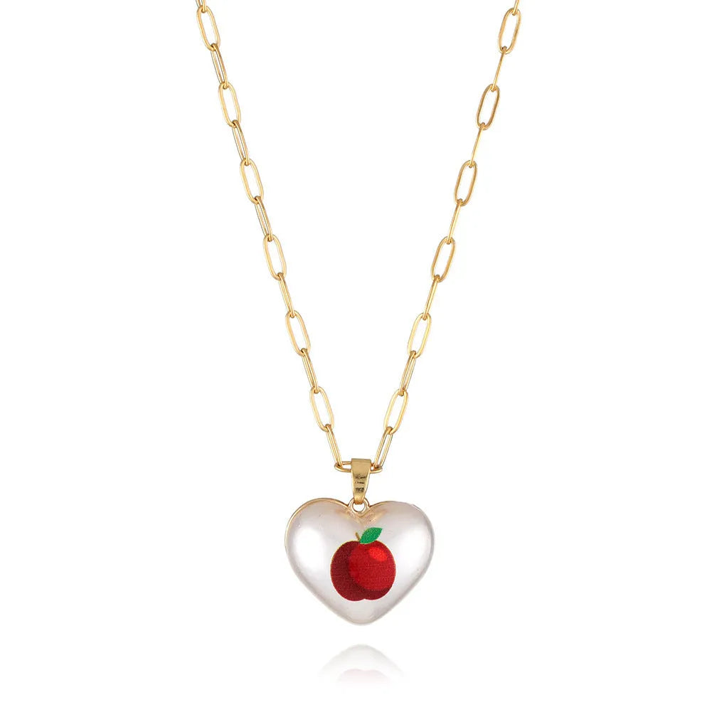 Geometric fruit pendant necklace on an adjustable chain, showing apple, cherry, pear, pineapple, and strawberry charm options.