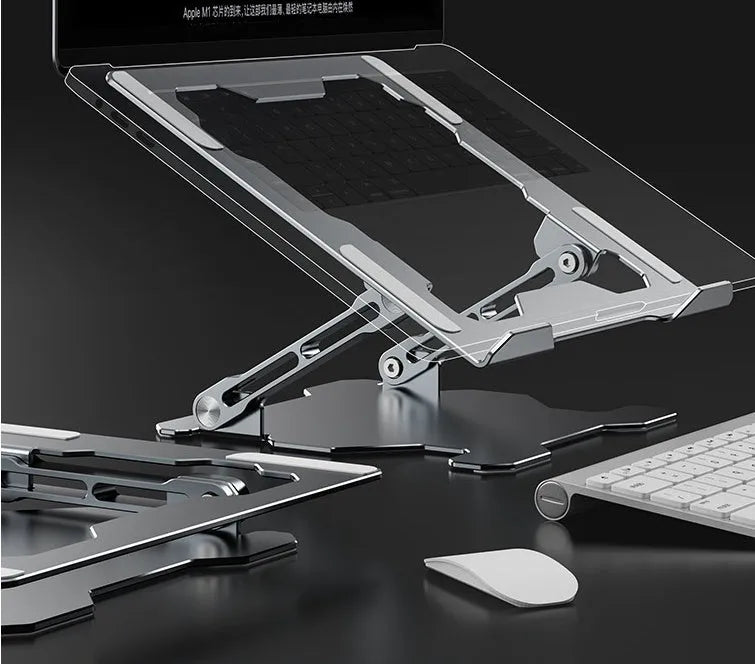 Grey aluminum laptop stand in folded position showing adjustable mechanism and silicone protection points