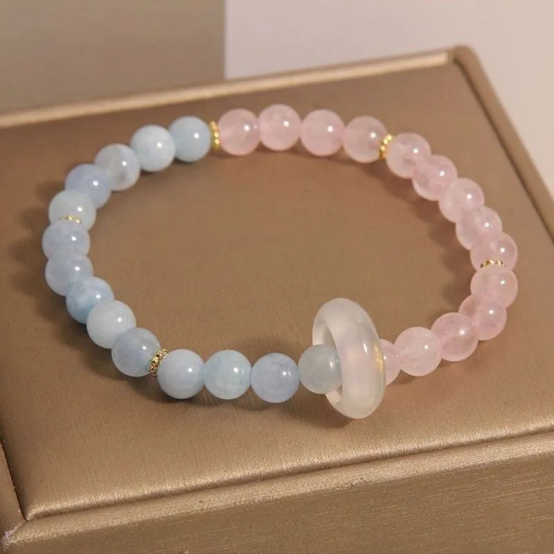 Aquamarine crystal women's bracelet with mixed materials and geometric round elements