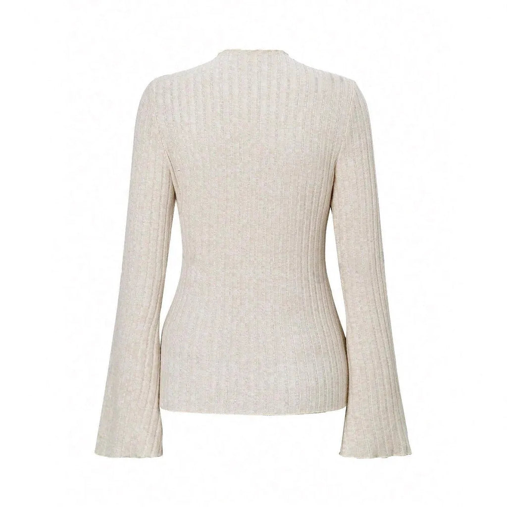 Long sleeve round neck polyester top in black with lantern sleeves, slim fit silhouette