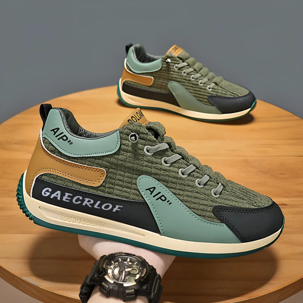 Men's grey and green mesh running shoes with round toe and lace-up closure shown in sizes 39-44