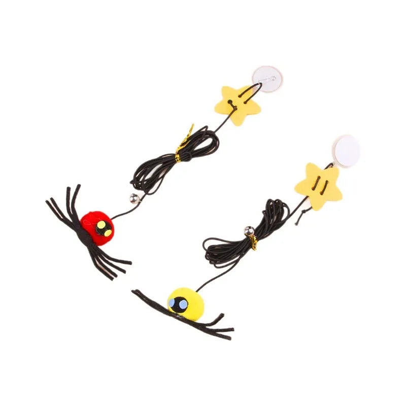Red and yellow cat hanging door toy with elastic rope, feather, bell, and spider attachment