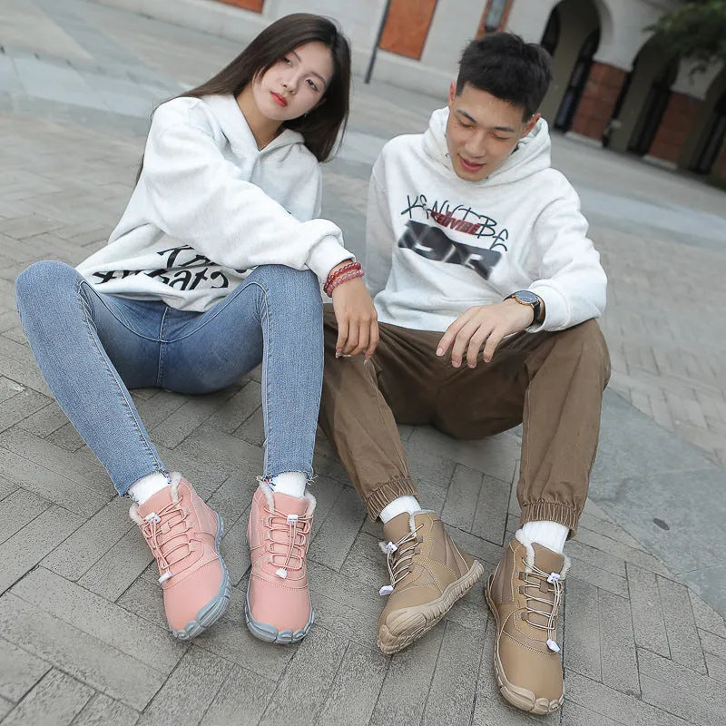 Unisex black waterproof snow boots with fleece lining and rubber soles on a white background