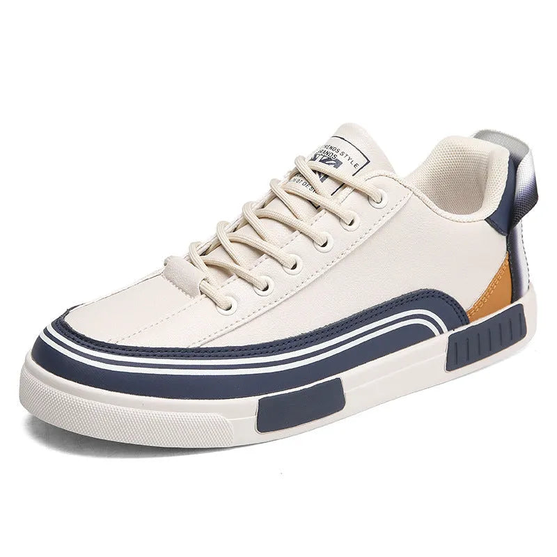 Men's white and green canvas casual shoes with visible mesh panel sections on a flat heel.