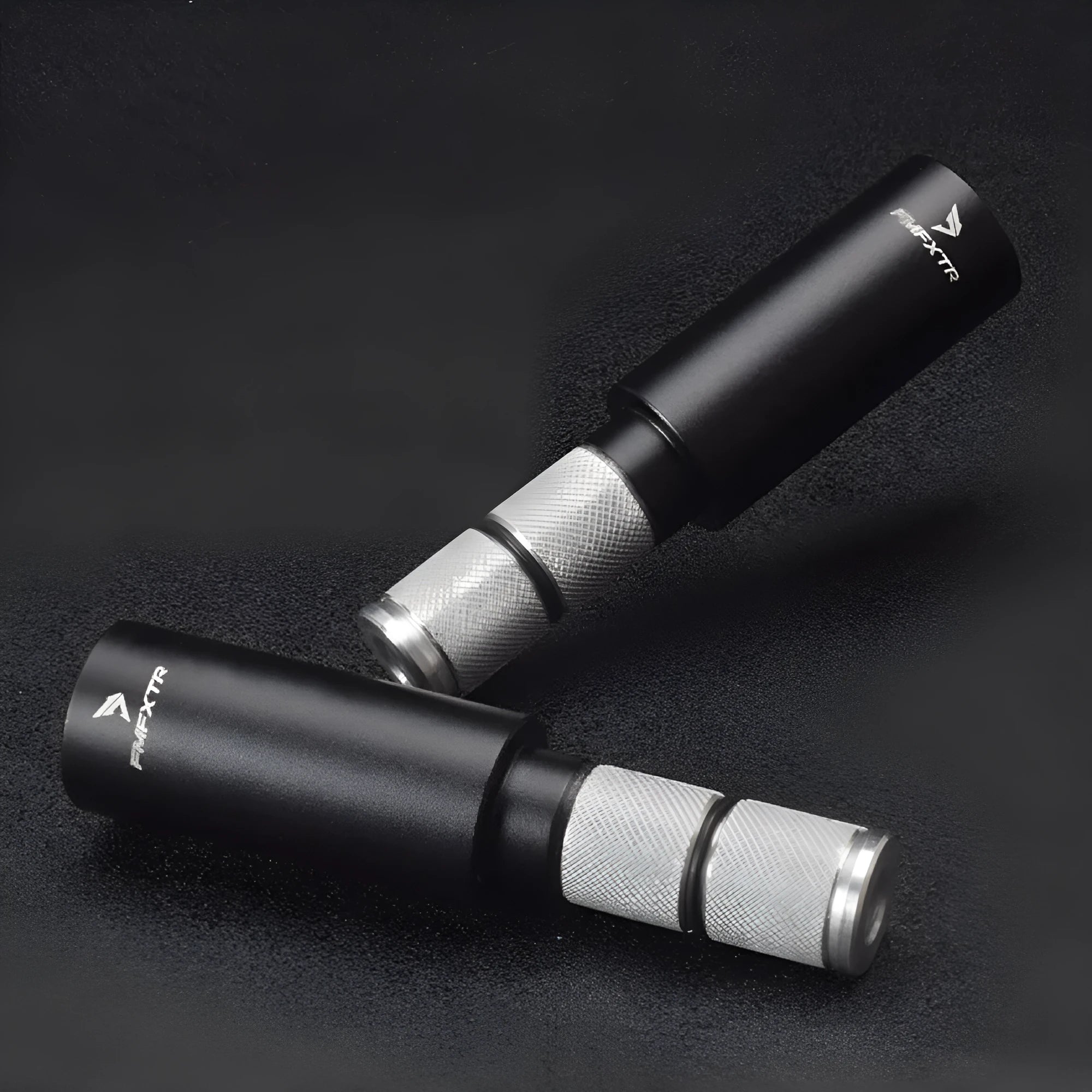 A pair of silver aluminium alloy bicycle handlebar extension rods for mountain bikes, showing folding design.