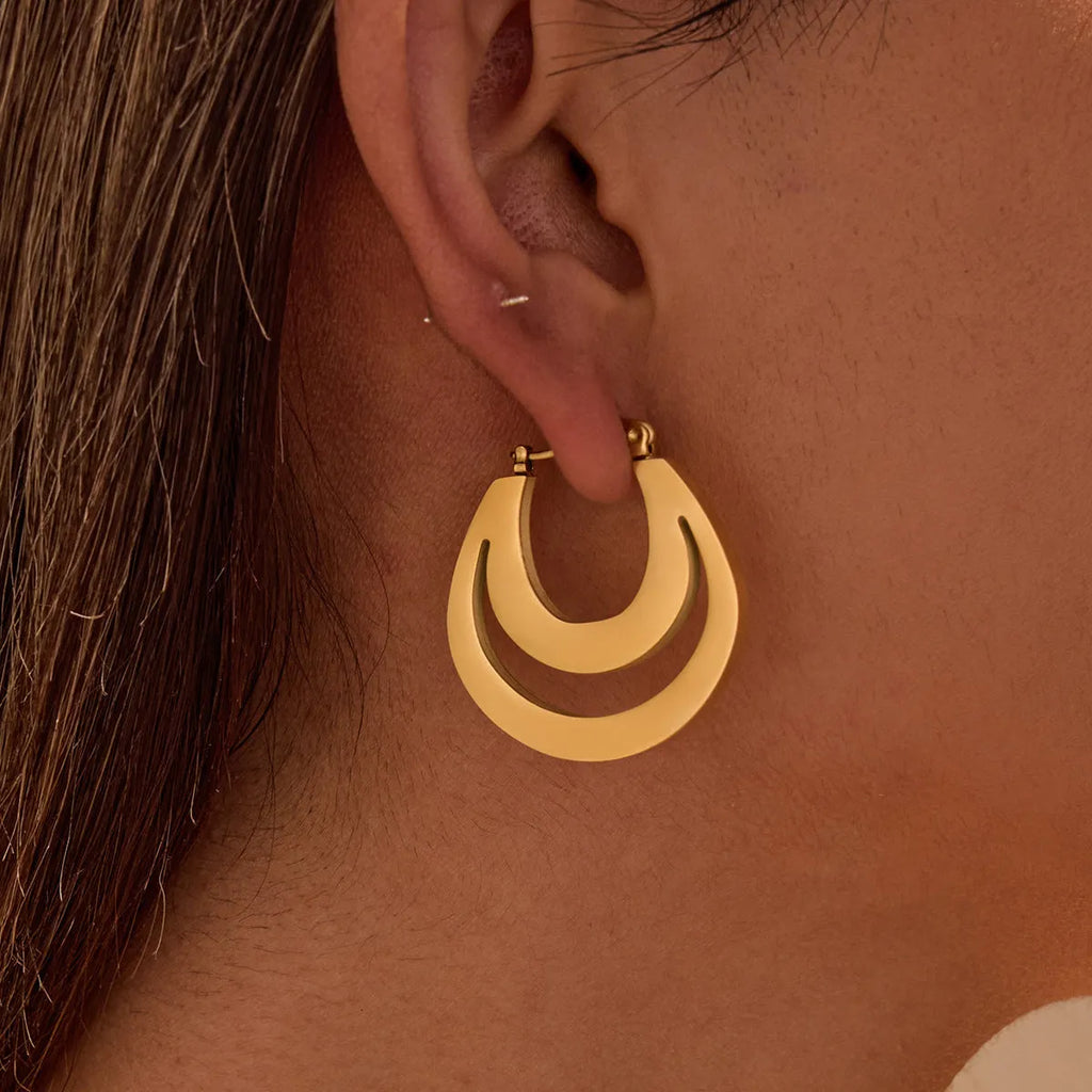 Geometric gold-plated French earrings with stainless steel construction and round ring design elements
