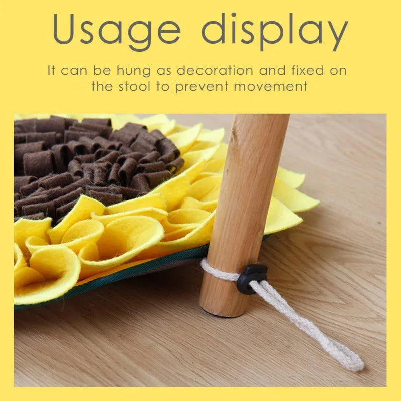 Yellow sunflower-shaped dog snuffle mat with fleece petals for treat hiding and slow feeding
