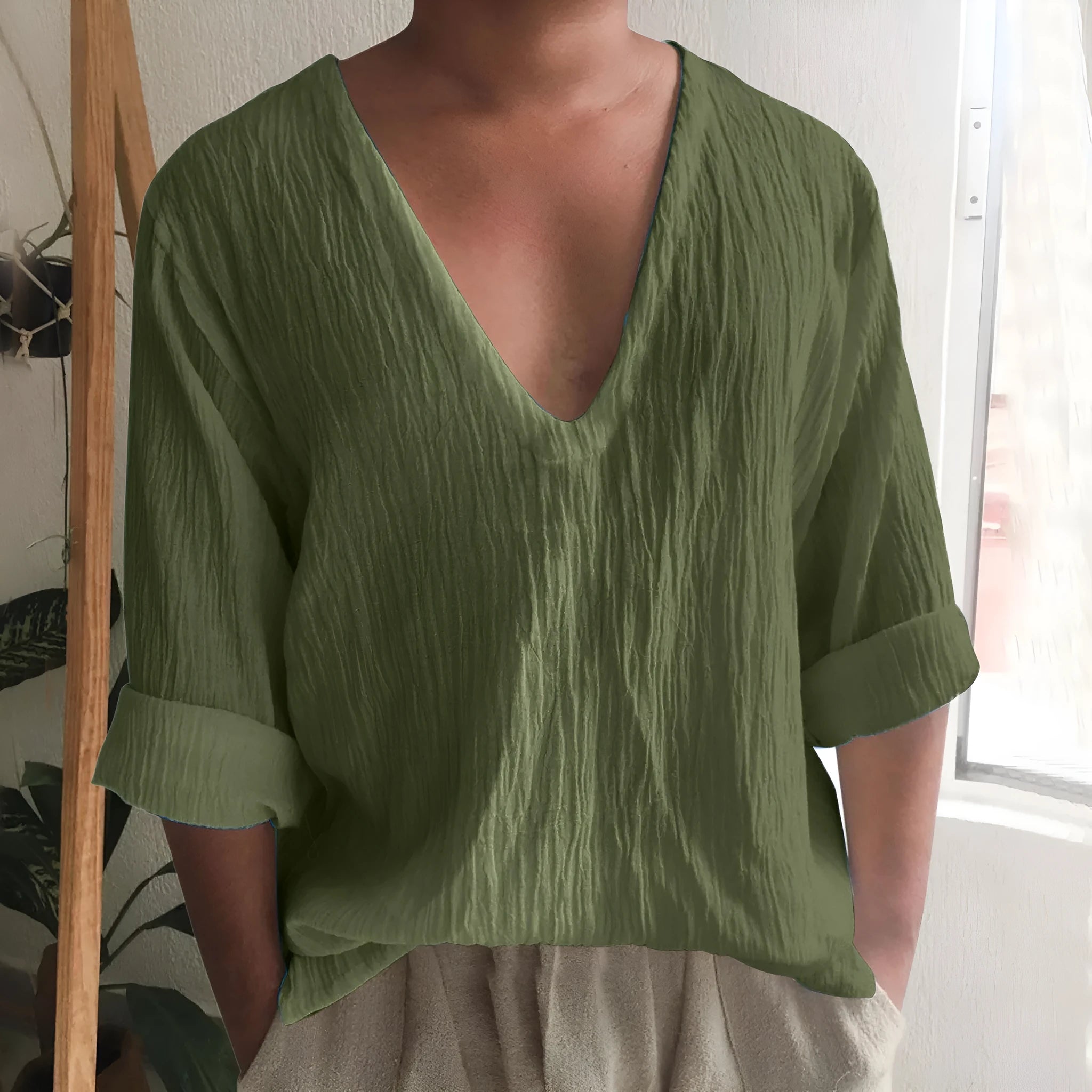 Men's washed cotton V-neck long sleeve T-shirt in solid colours on a size chart.