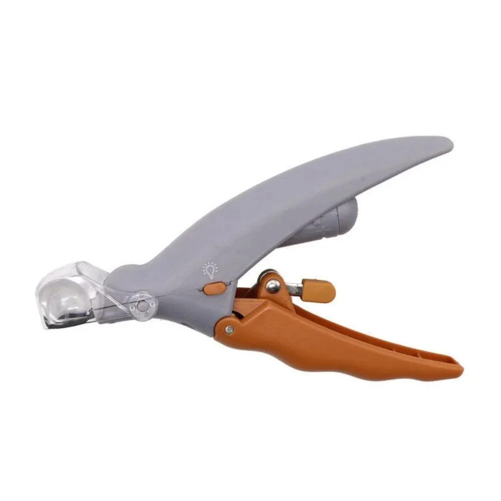 Yellow pet nail clipper with LED light, magnifying glass, and safety guard for dog and cat grooming.