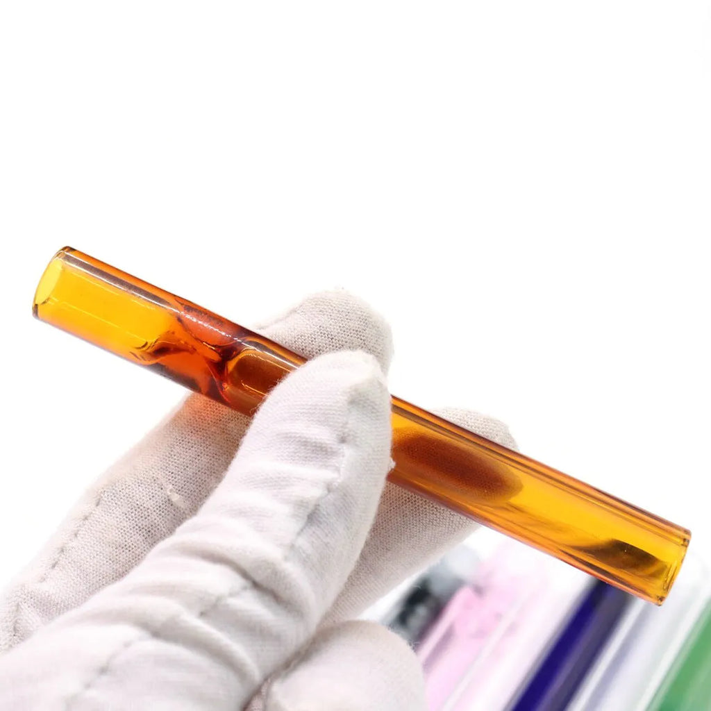 Clear glass telescopic smoke pipe with straight suction nozzle showing transparent colour-mixing effect