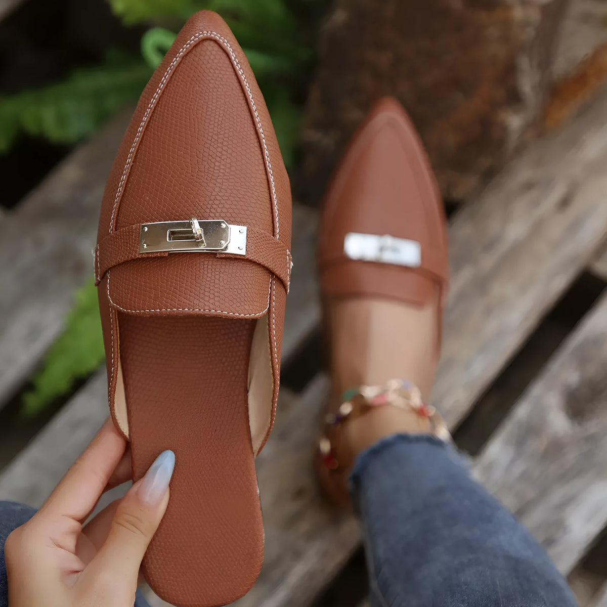 Light brown women's pointed-toe low heel semi-slippers on a white background
