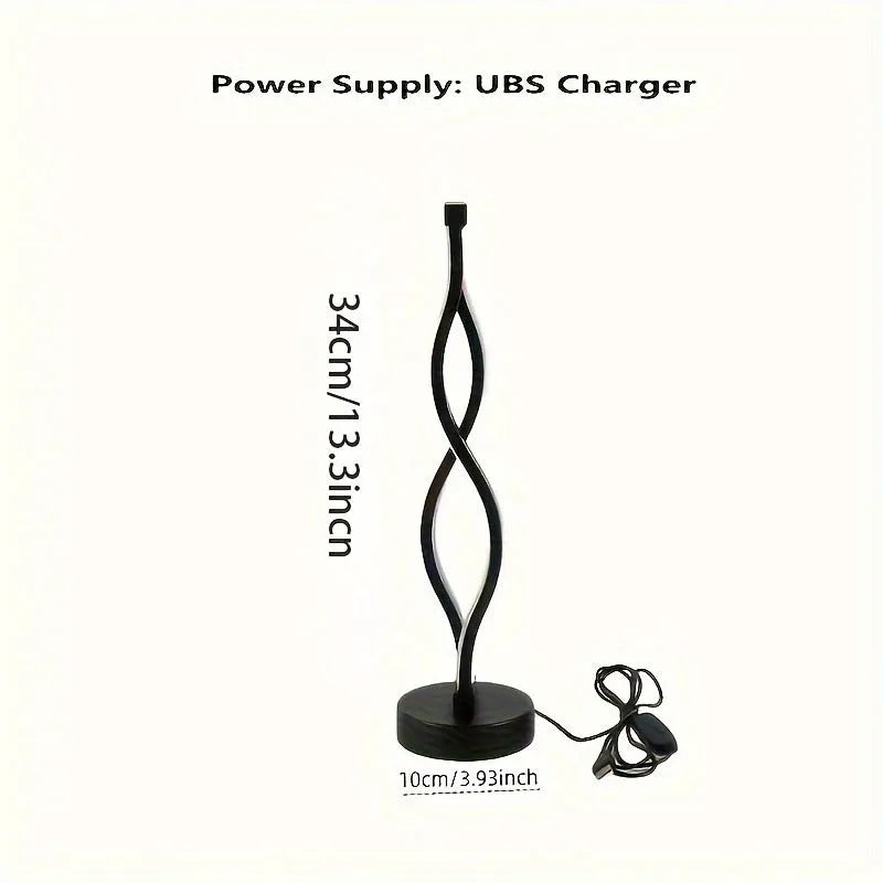 Black aluminium desk lamp with touch dimming and a three-colour button on a desktop