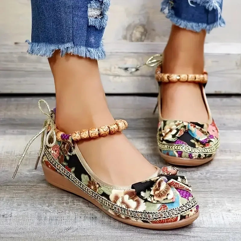 Women's black ethnic style platform sandals with cloth upper and elastic band, plus size range.