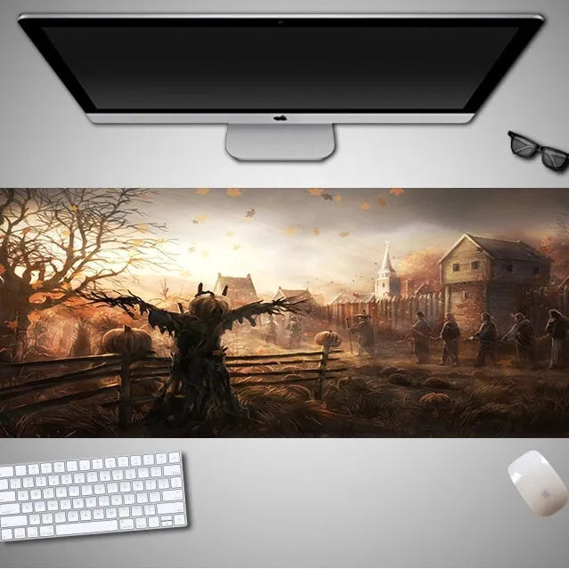 Oversized Halloween pattern mouse pad on a desk showing non-slip rubber base and cloth top.