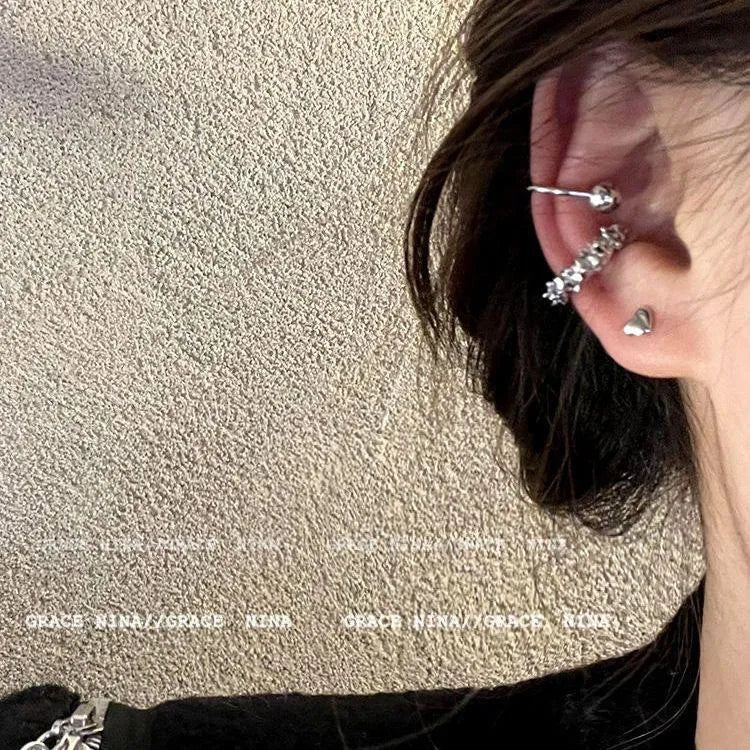 Women's clip-on earrings with irregular geometric shape and frosty finish in alloy