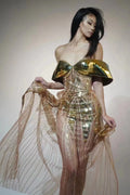 Gold strapless sequined evening dress with high split skirt and full sequin coverage