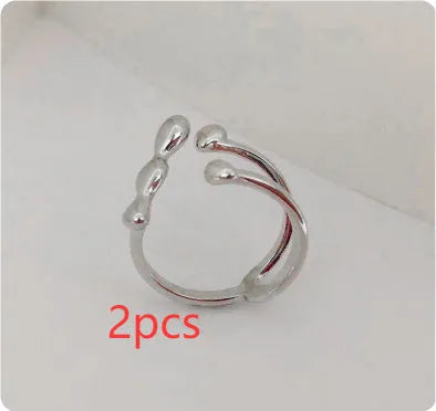 Brass opening ring with sphere circle detail in gold colour, adjustable women's fashion jewellery