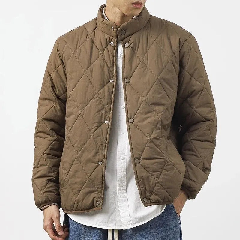 Men's black diamond lattice pattern cotton-padded winter jacket with a lengthened loose fit.