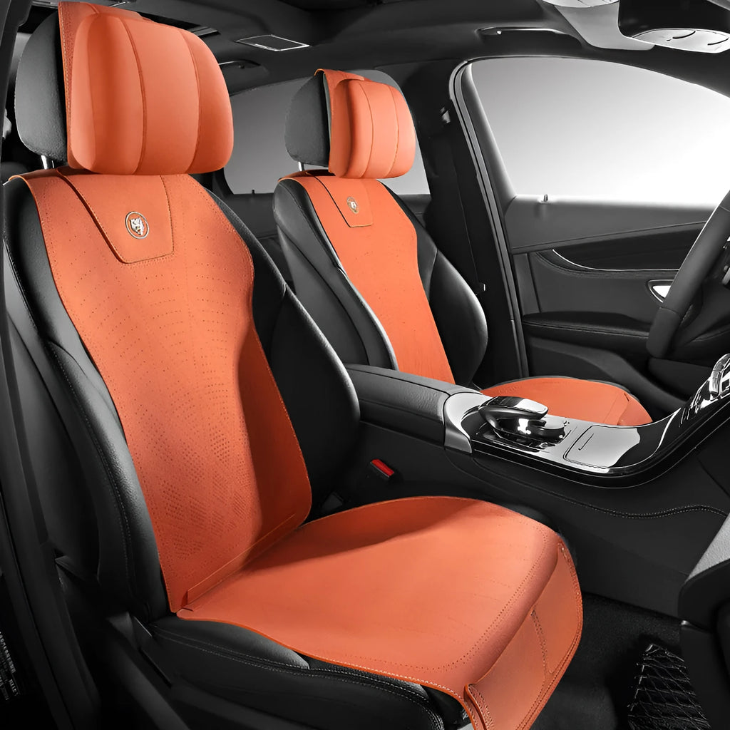 Genuine leather and fur car seat cover with patterned ventilation holes on a car seat.