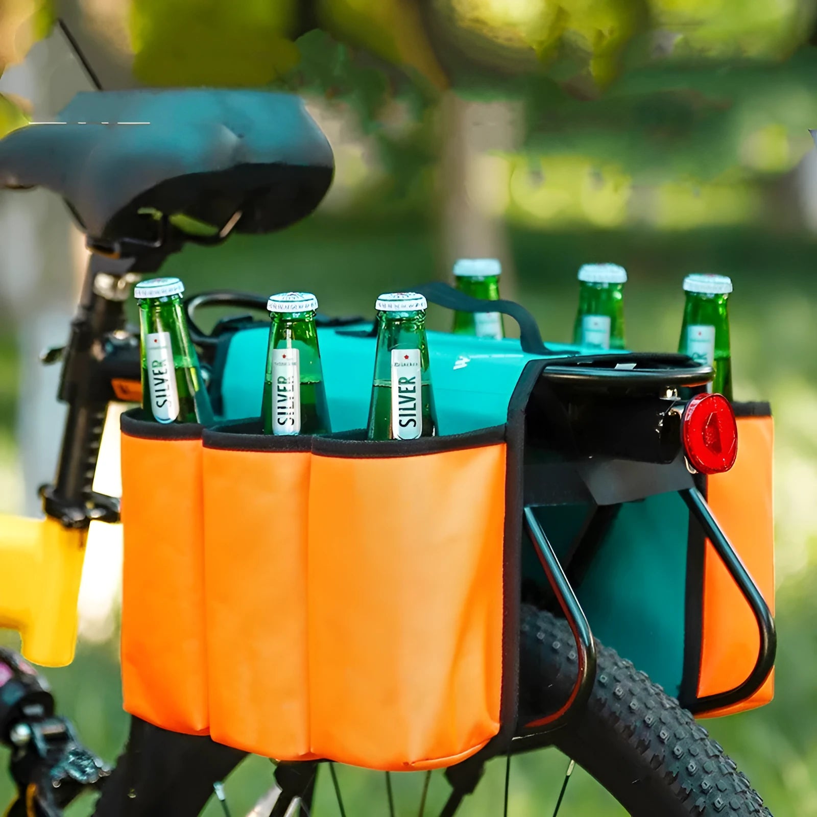 Black and orange double-sided bicycle beverage bag mounted on bike frame with 2L capacity