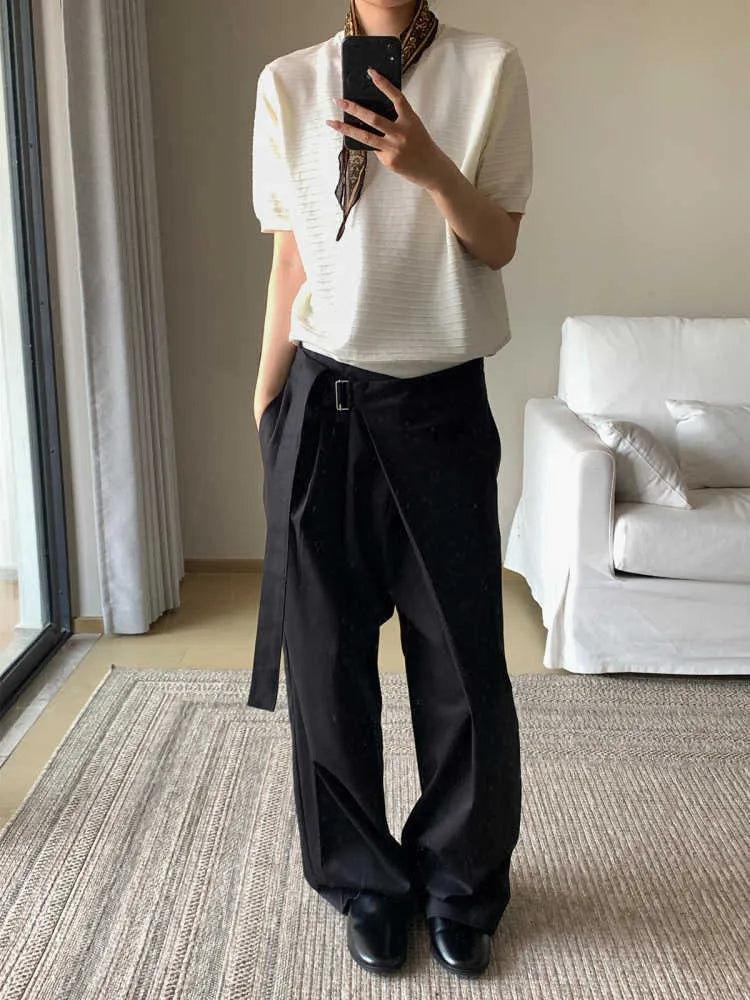 Black straight-leg trousers with a single pleat and adjustable waistband, laid flat.