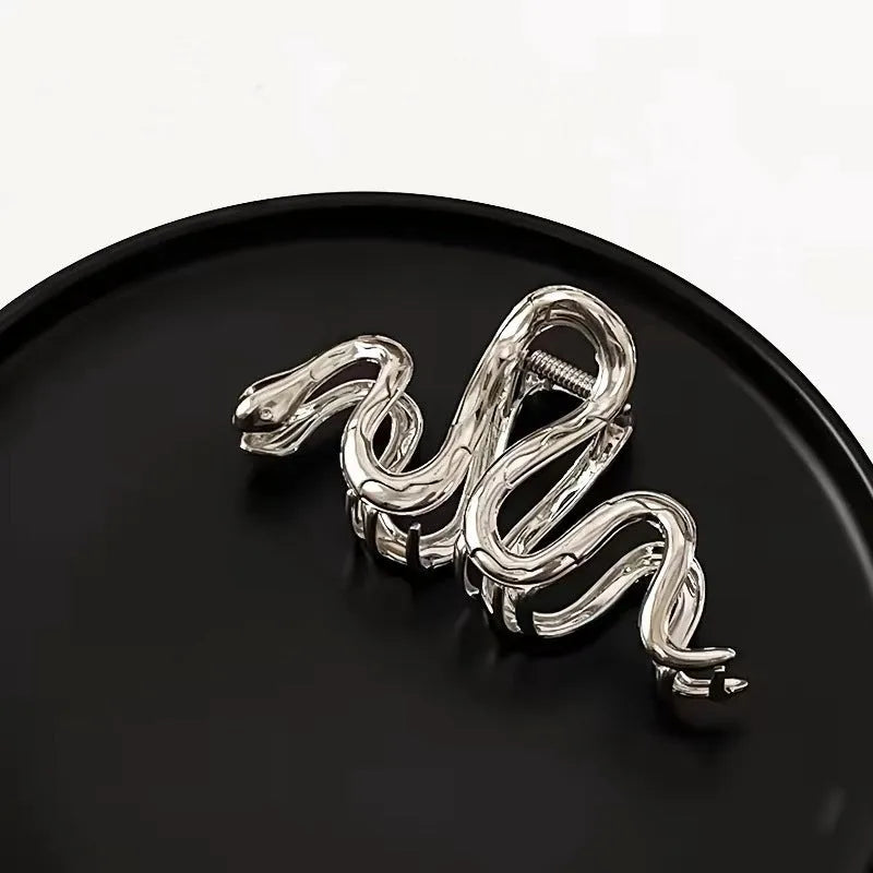 Slytherin serpentine snake design metal hair clip barrette in silver and gun black, 10.5cm long.
