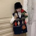 Loose sleeveless cardigan top with diamond plaid pattern in khaki colour.