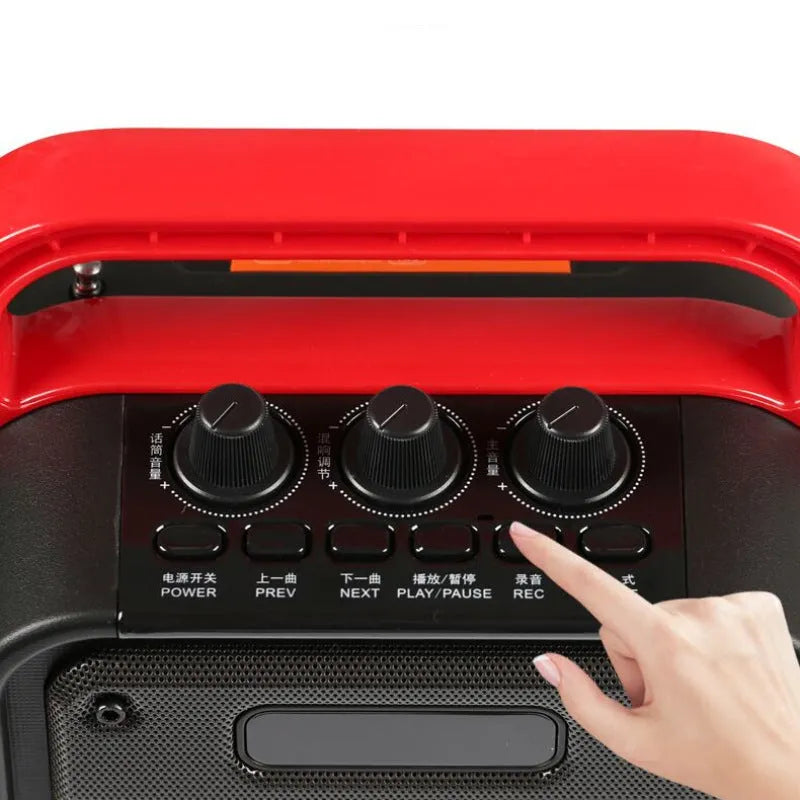Portable MS62AI Bluetooth speaker with wireless microphone and remote control on a table
