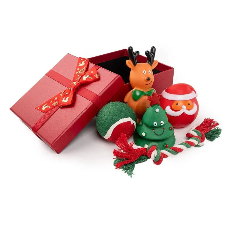 Christmas dog chew toys vinyl gift sets with festive designs including trees, Santa heads, tennis balls and bite ropes