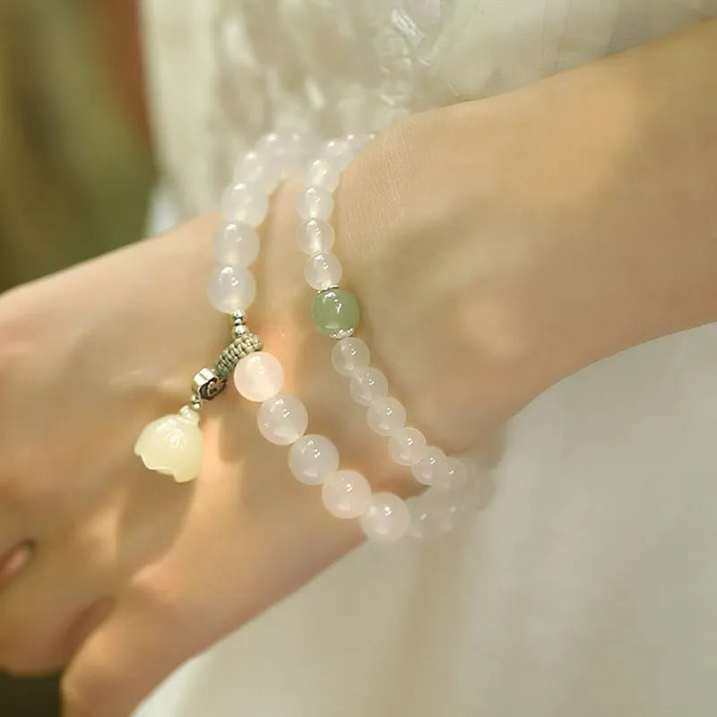 Women's bracelet with S925 silver clasp, white agate and Hetian jade beads in geometric lotus design