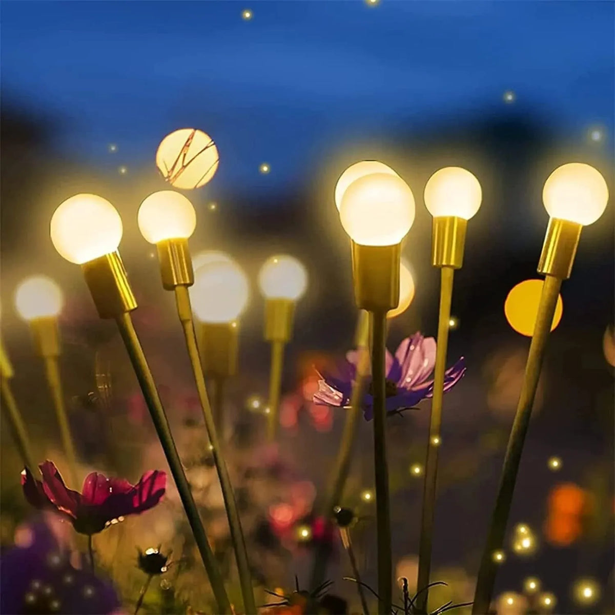 Solar-powered LED garden light with multiple heads on a metal spike in grass.