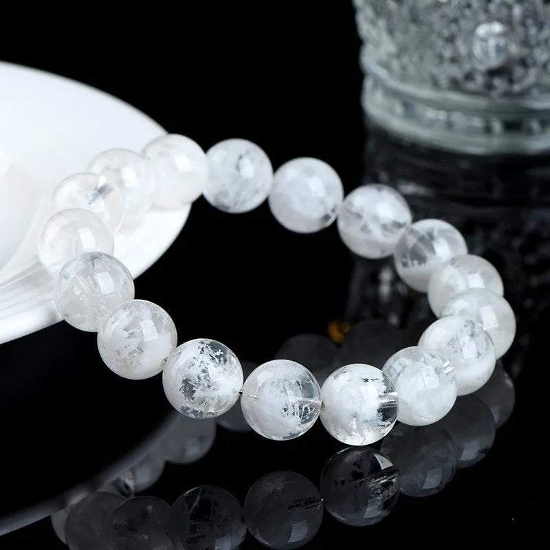 Natural crystal women's bracelet with blizzard snowflake round beads and geometric design featuring Ruyi Xiangyun elements