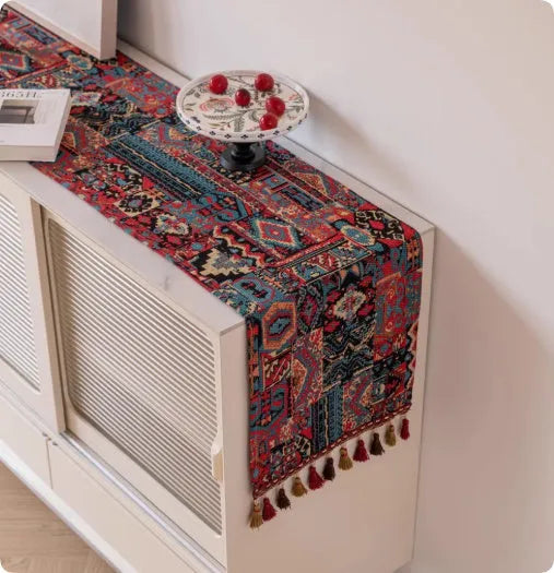 European retro cotton linen style table flag with handwoven tassels in blue ginkgo leaves pattern on sideboard