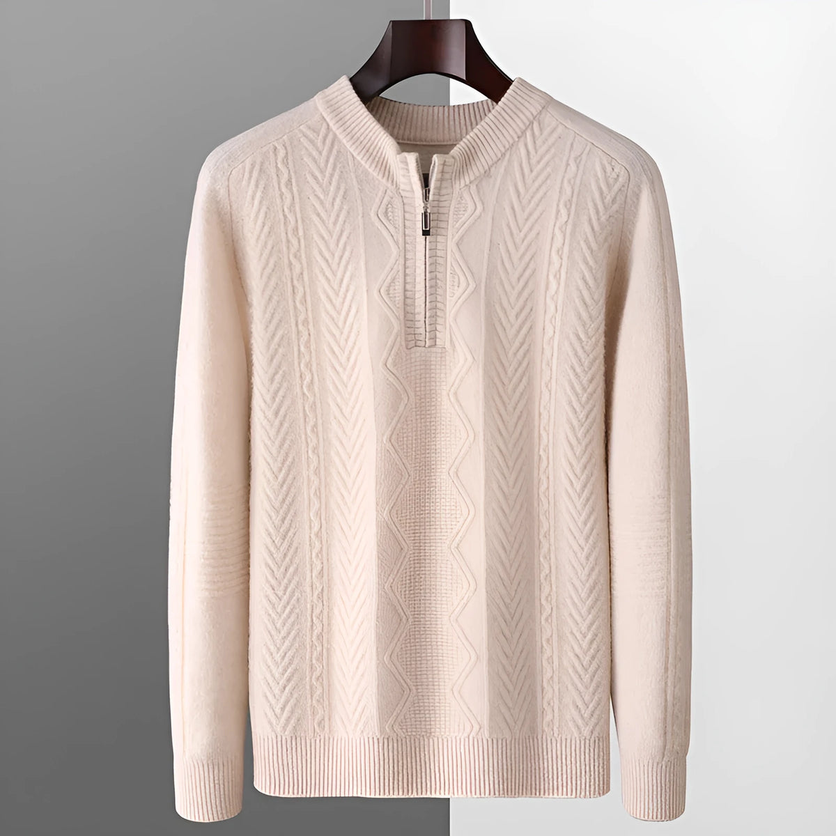 Men's grey diamond pattern wool half-zip sweater laid flat.