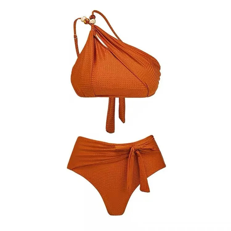 Women's brown high waisted push up bikini swimsuit with a sheer black chiffon dress overlay attached