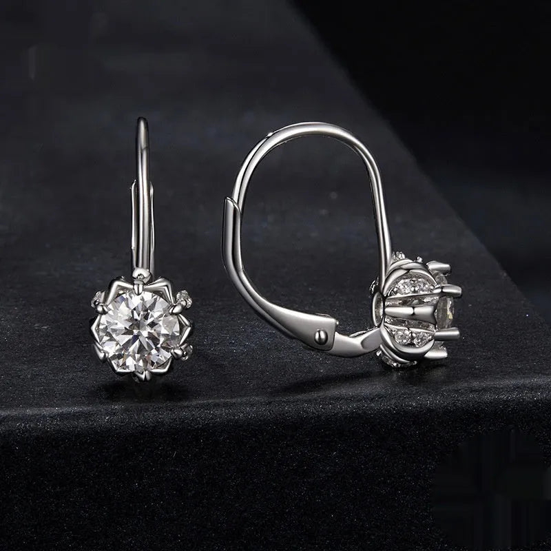 Sterling silver flower bud ear clip earring with white gold plating and moissanite stones