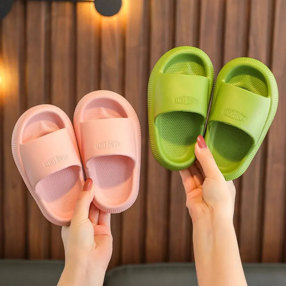 Children's mixed colour EVA slippers with non-slip soles showing 1.5cm thickness