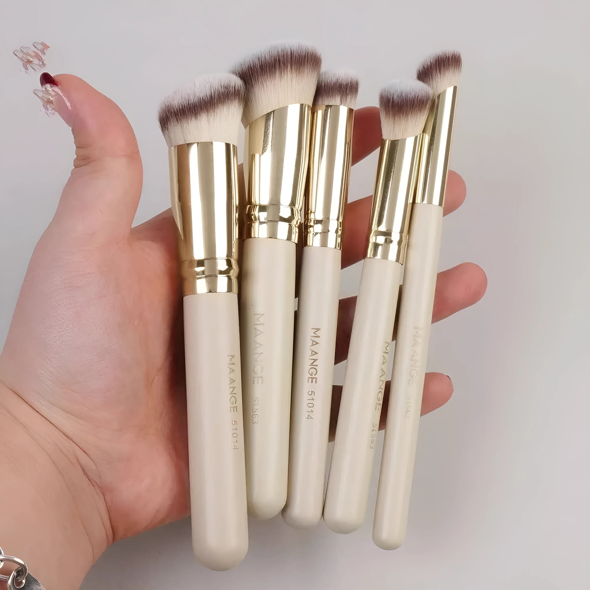 MAANGE five angled apricot-coloured kabuki makeup brushes for foundation, blush, and powder application