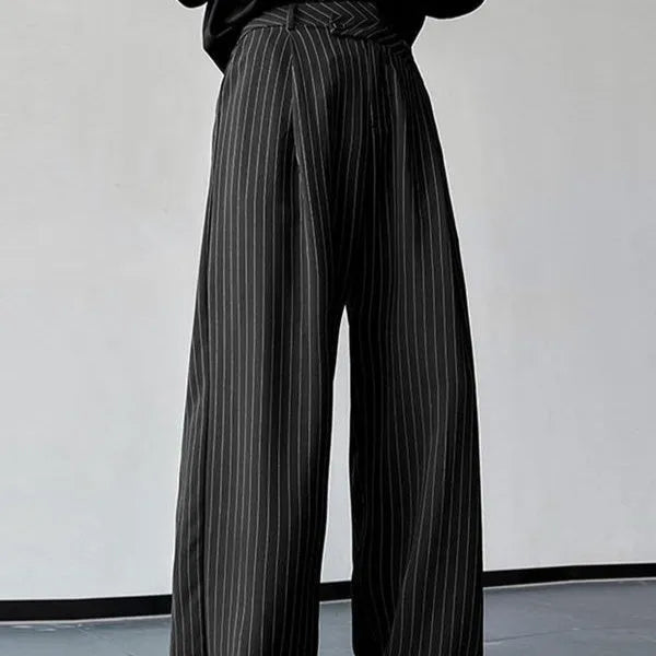 Men's black vertical striped pleated casual trousers with high elasticity fabric, laid flat.