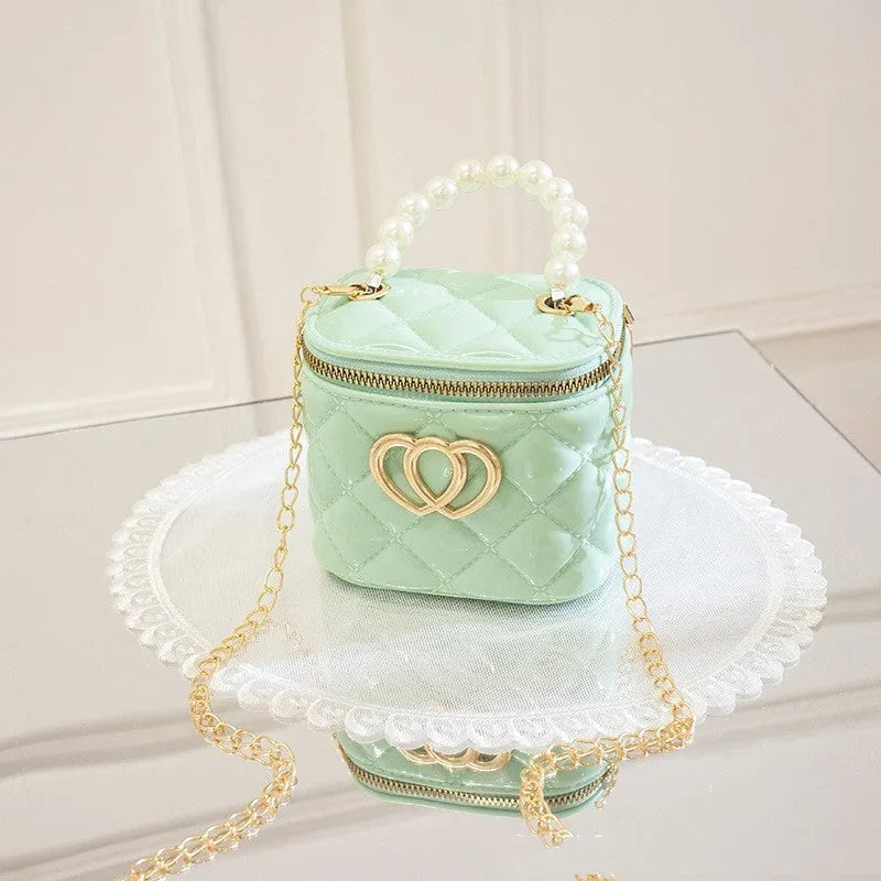 PVC bucket gel handbag with heart pattern in multiple colour options including apricot, black, green, orange, red, white and yellow