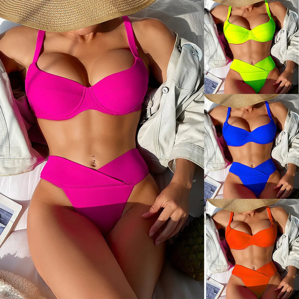 Solid colour bikini swimsuit on a mannequin, showing the sleeveless bra and briefs in a fluorescent hue.