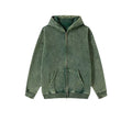 Man wearing a dark green fleece-lined hooded cardigan sweater with a double zipper.