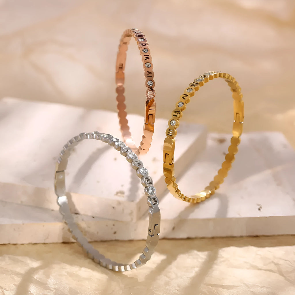 Korean style titanium steel bracelet with number charms in steel, gold or rose gold colour