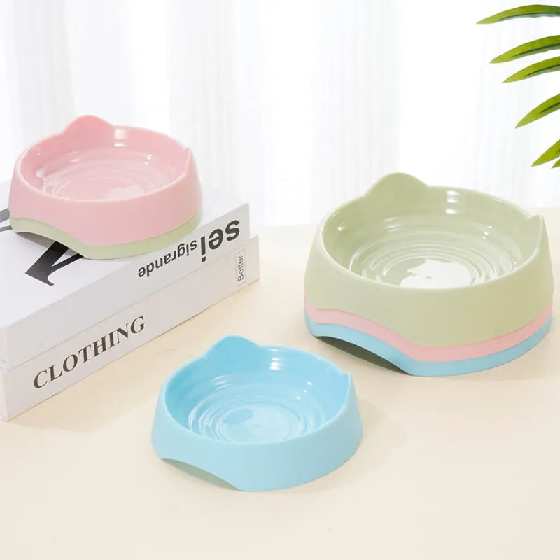 Ceramic dog slow feeder bowl with maze design in blue, green, or pink colours for fast-eating puppies