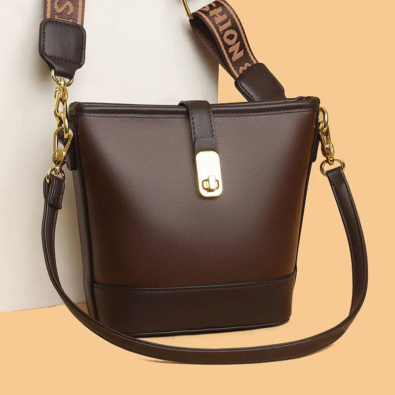 Korean style soft PU bucket messenger bag in black or brown with organised interior compartments