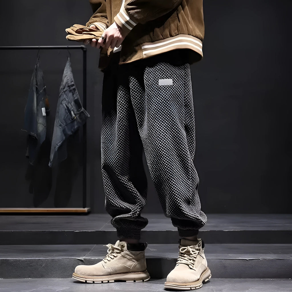 Men's grey straight leg sweatpants with ankle tie fastening on waistband