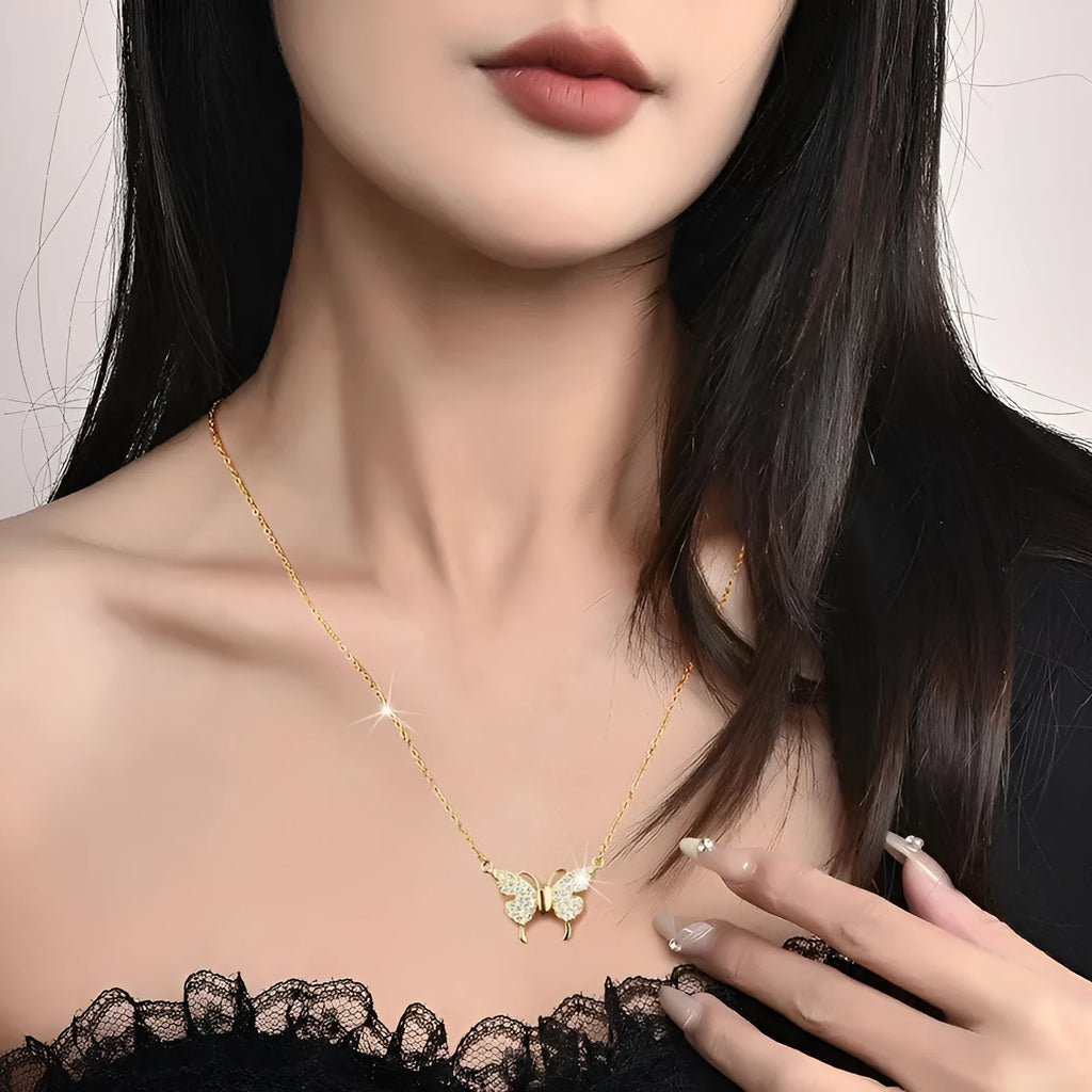 Gold titanium steel twisted chain clavicle necklace with magnetic butterfly snap closure.