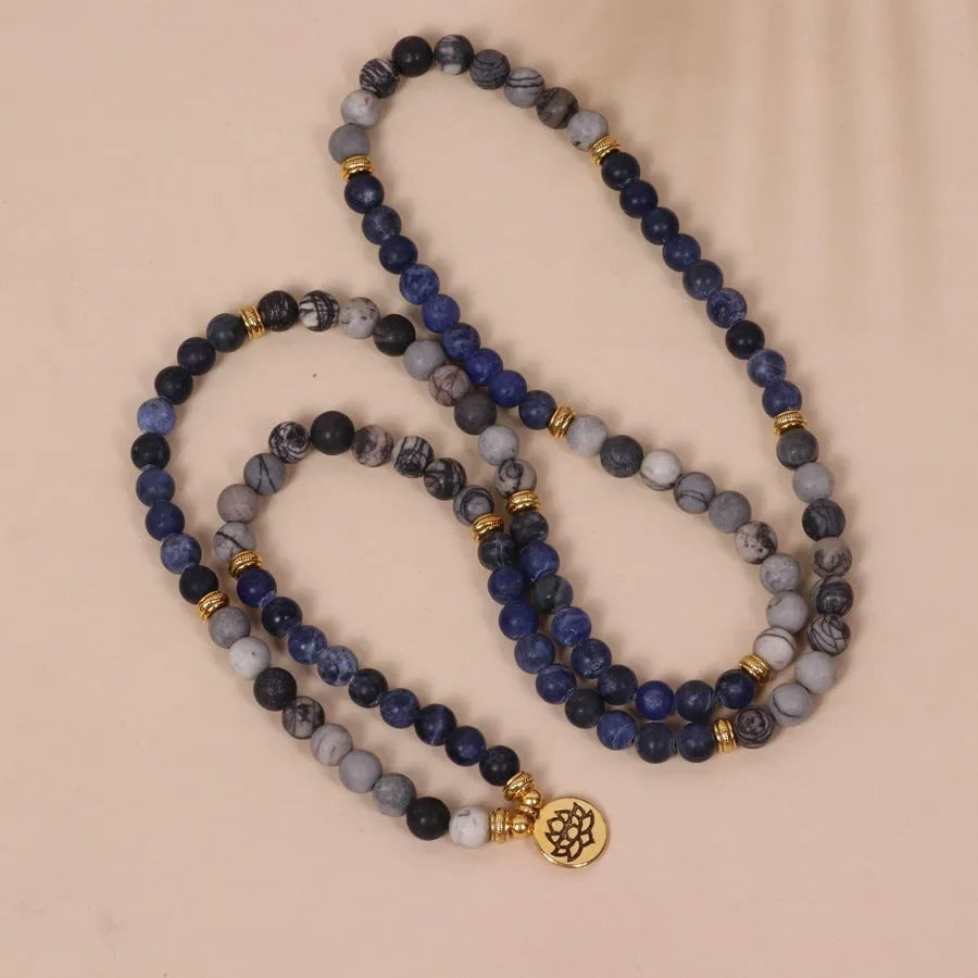 Blue multi-layer bracelet with patterned network stone beads and alloy metal components
