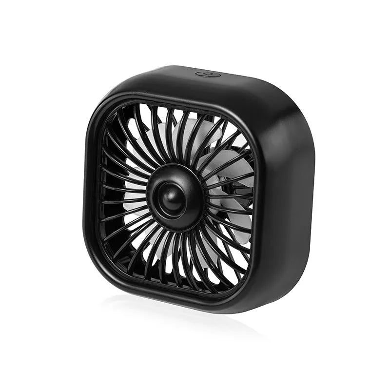 Compact black USB car fan with three speed buttons on dashboard