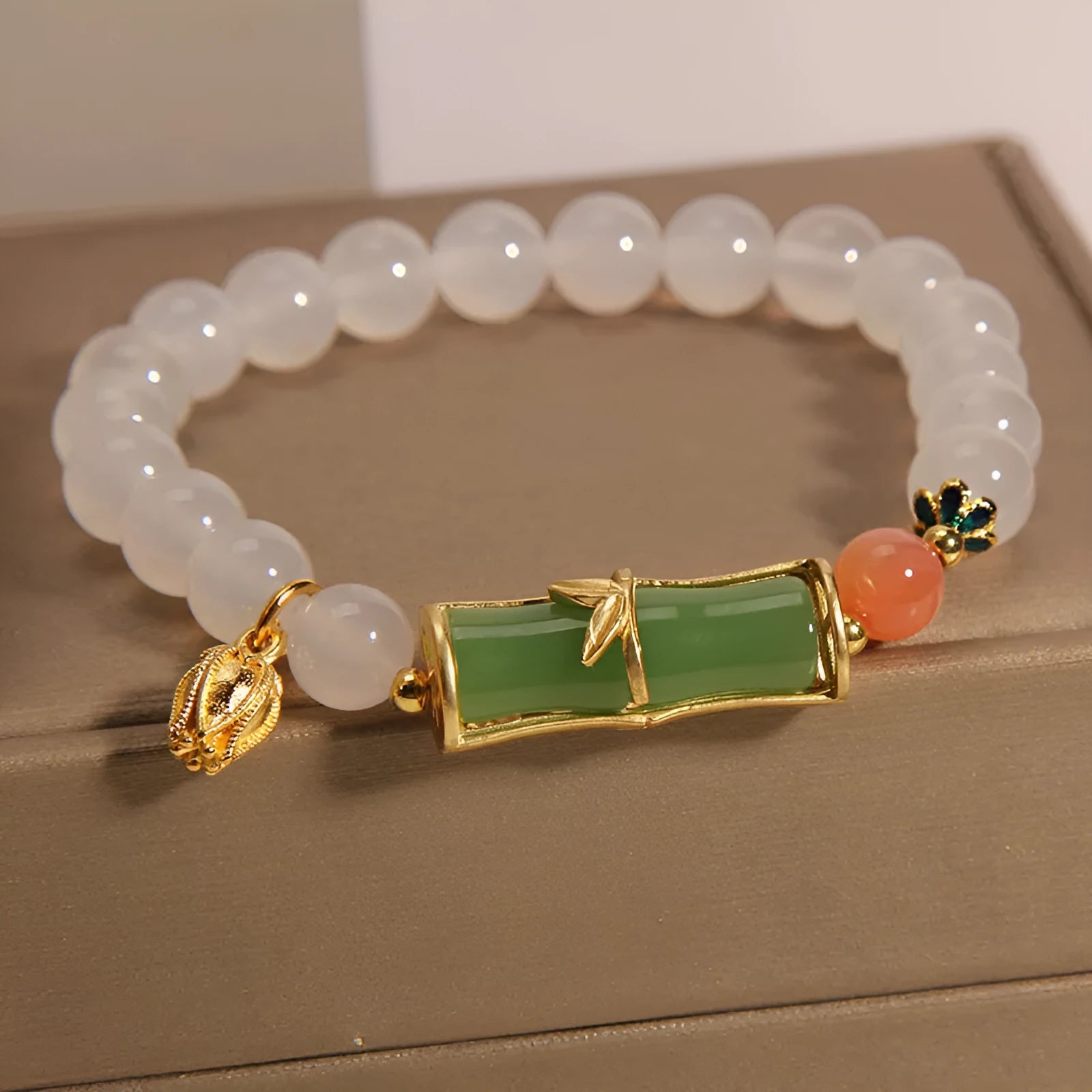 White agate and jade Chinese style bamboo beaded bracelet for women with retro luxury design